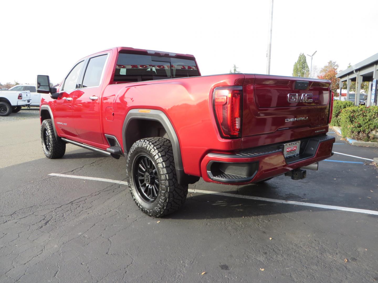 2021 MAROON /BLACK GMC Sierra 3500HD Denali (1GT49WEY1MF) with an Duramax 6.6L Turbo Diesel engine, 10 speed transmission, located at 2630 Grass Valley Highway, Auburn, CA, 95603, (530) 508-5100, 38.937893, -121.095482 - Duramax sitting on a BDS level kit with upper control arms and Fox shocks, 20" XD wheels, and 35" Nitto Ridge Grappler tires. - Photo#6